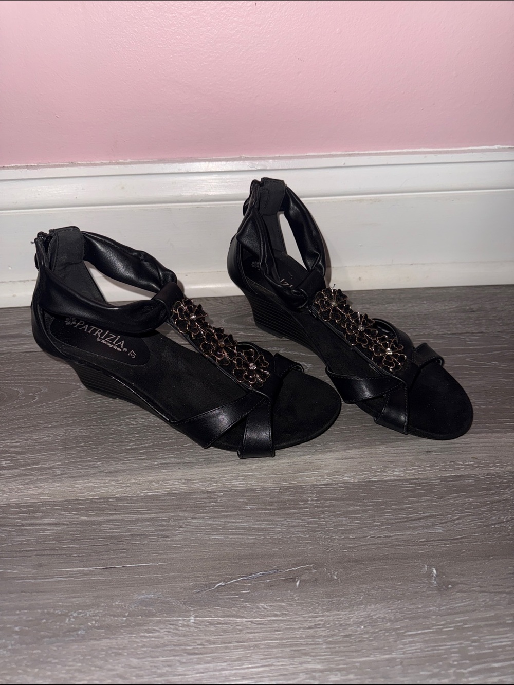 Patrizia Black Wedge Sandals with Decorative Floral Accent